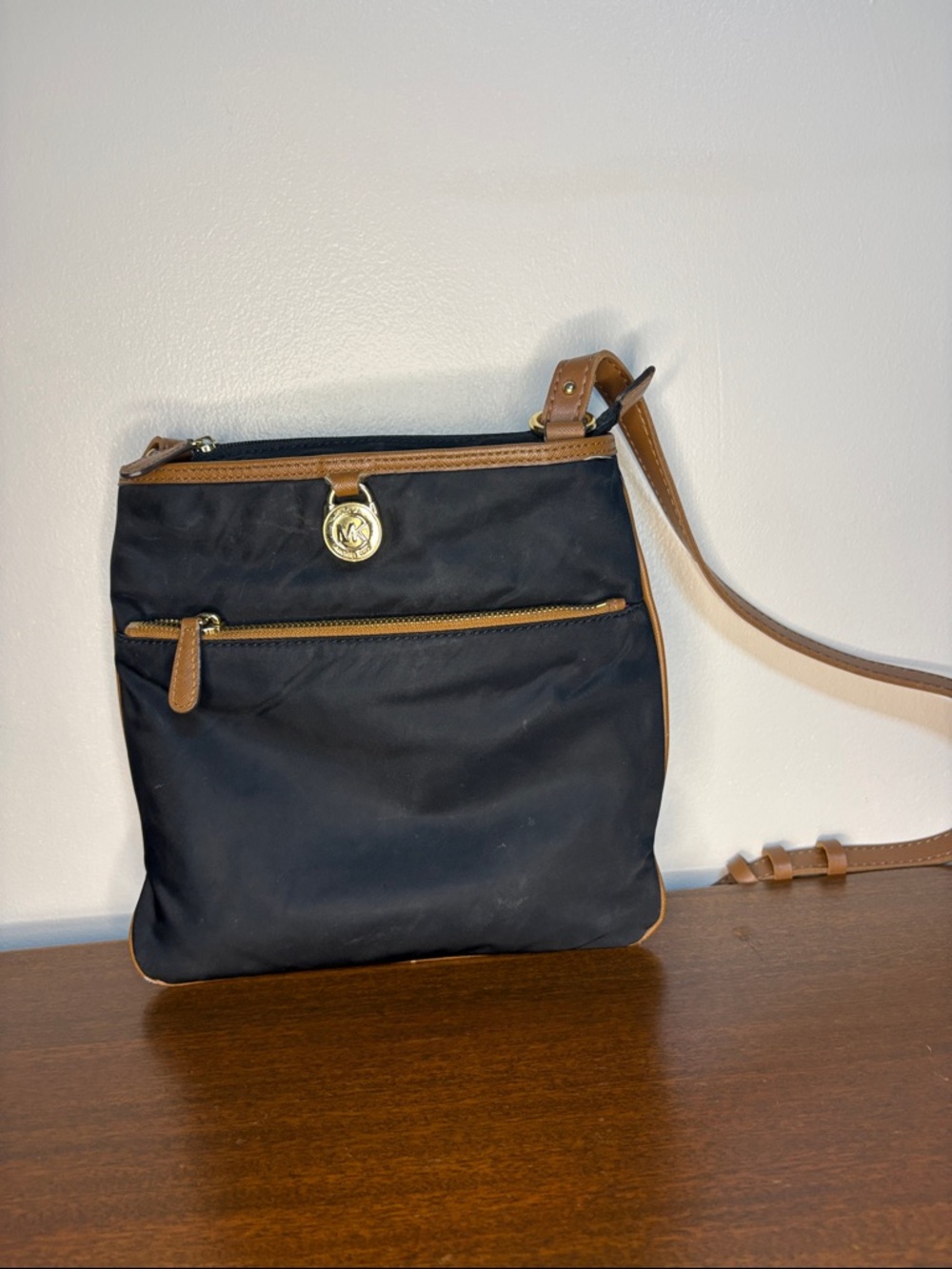 Michael Kors Black Crossbody with Brown Trim and Gold Accent